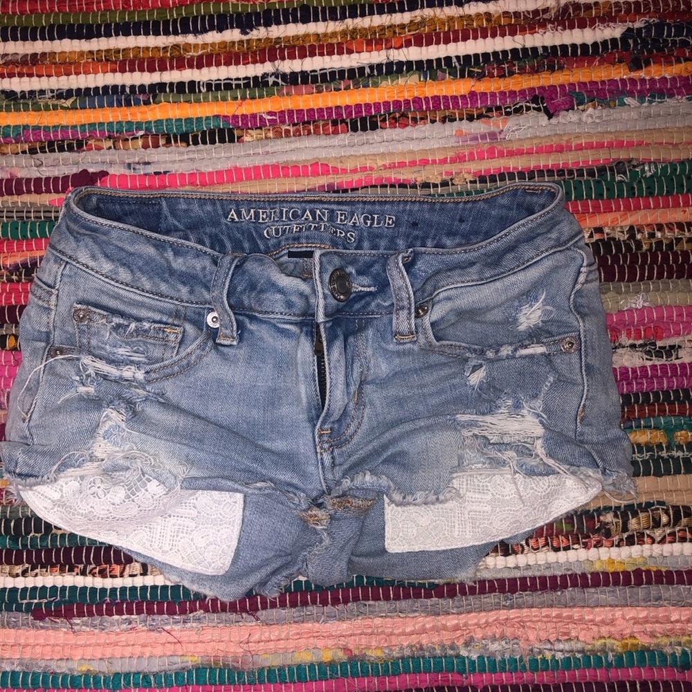 American eagle distressed white lace pocket shorts